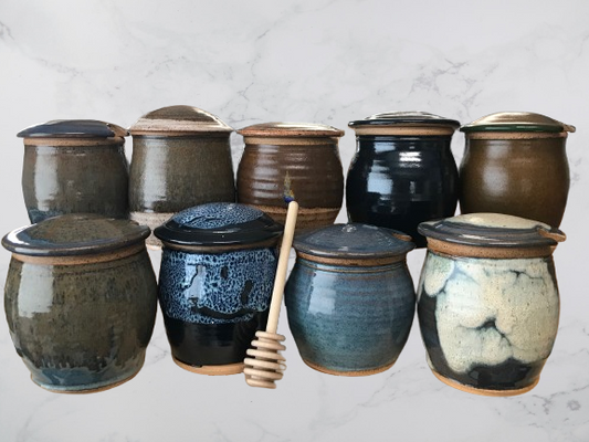 Handmade ceramic honey pots with honey dipper