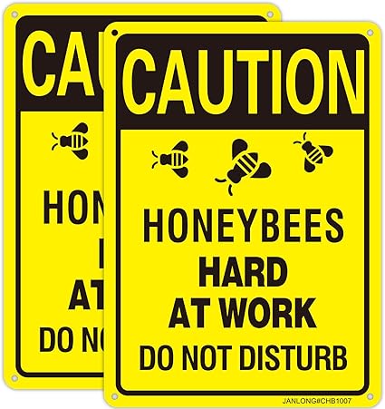 sign -  Caution honeybees hard at work