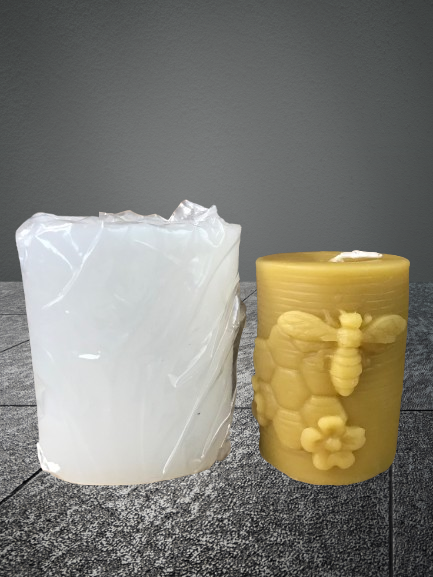 Pillar candle mold with bee, comb, and flowers