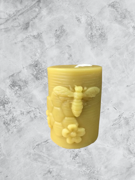 Pillar candle mold with bee, comb, and flowers