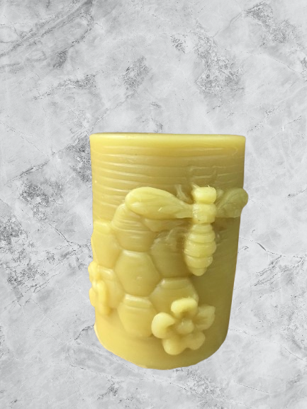 Pillar candle mold with bee, comb, and flowers