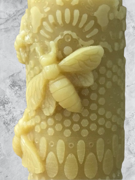 Pillar candle mold with bees