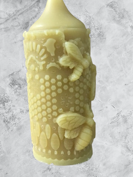 Pillar candle mold with bees