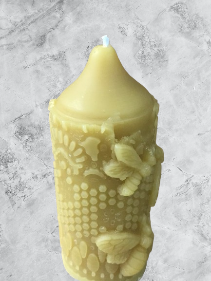 Pillar candle mold with bees