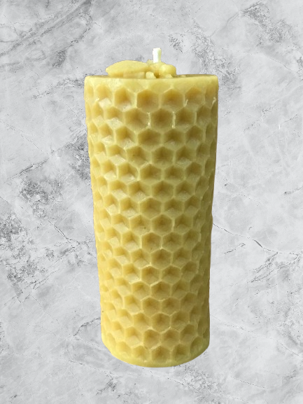 Pillar honeycomb candle with bee on top