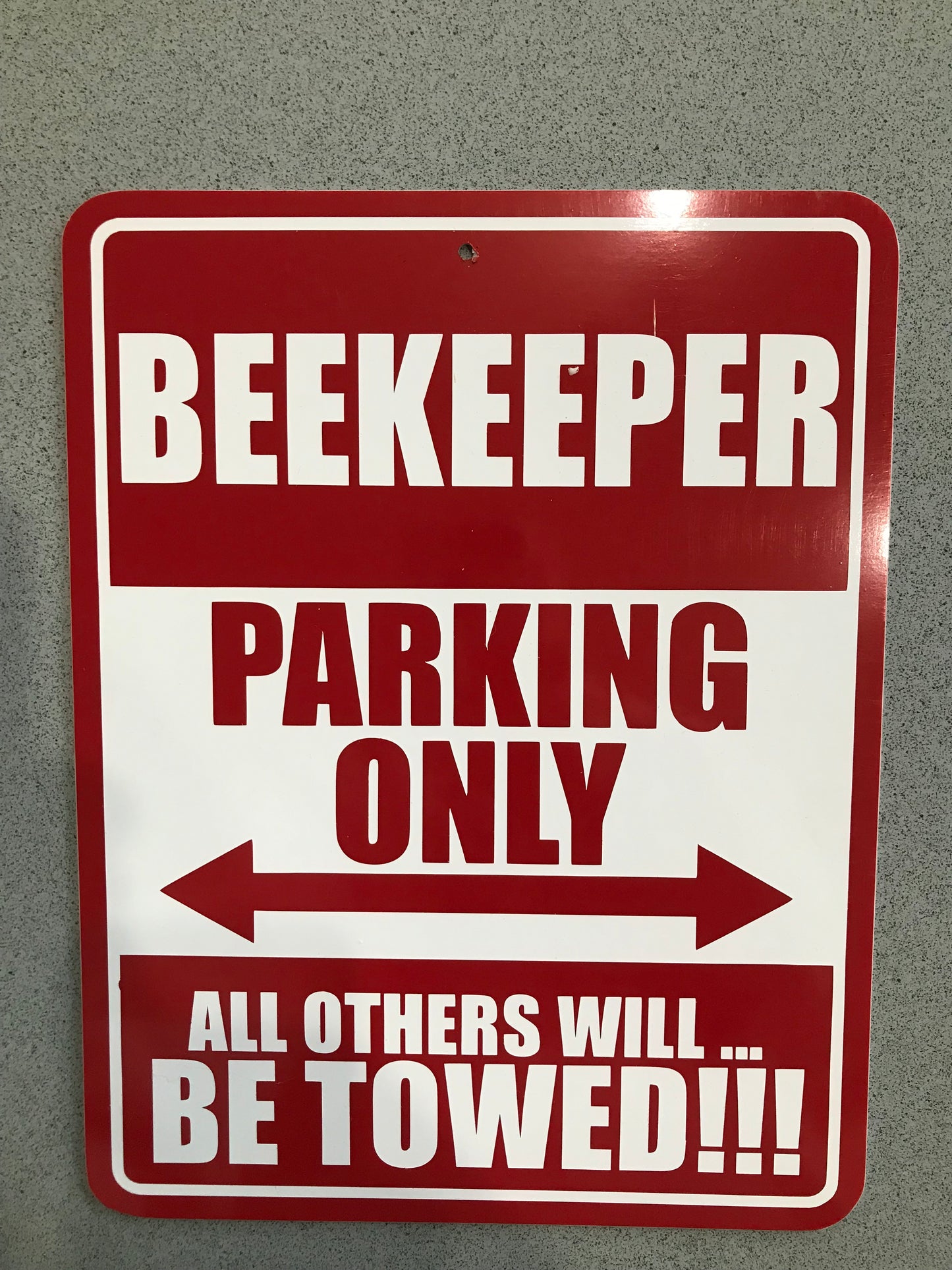 Beekeeper parking only all others towed